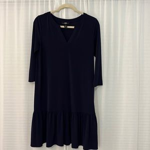 Dark blue conservative 3/4 sleeve dress with ruffle bottom